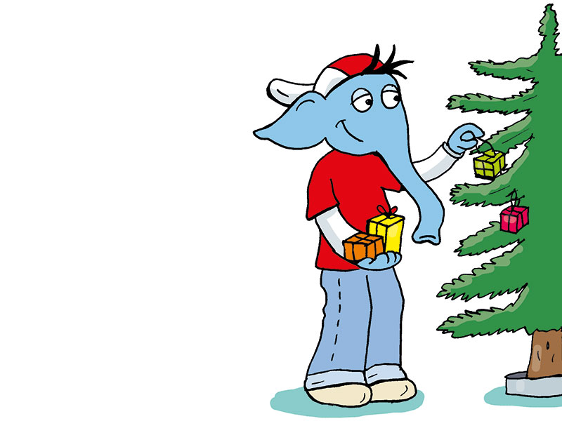 Der blaue Elefant Bimbo schmückt den Weihnachtsbaum